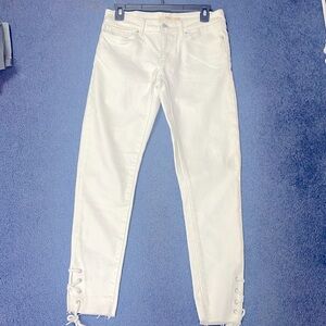 Cute Levi’s white denim pants with string laced bottoms. Size 27. Never worn.